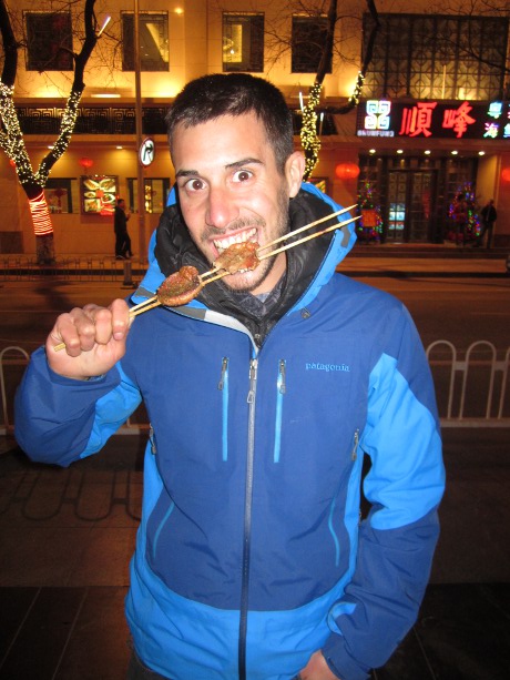 Ian tasting a Donghumen delicacy - Photo by Gerrard Darrah