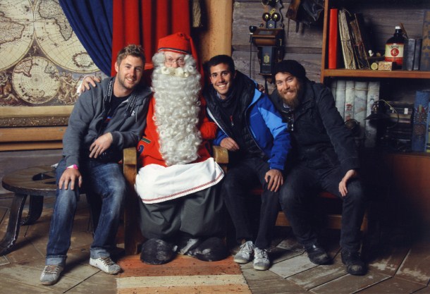 The boys and I pose with Santa at his workshop in Roveniemi, Finland