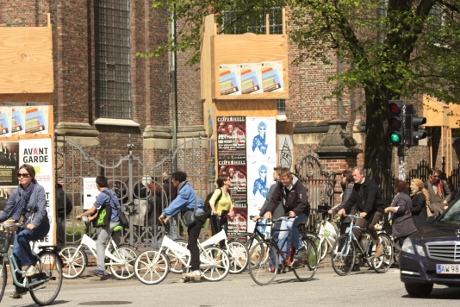 Commuters riding their bikes in Copenhagen, Denmark