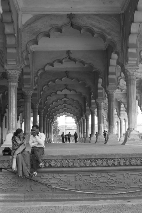 Couple chatting at the Agra Fort in Agra, India