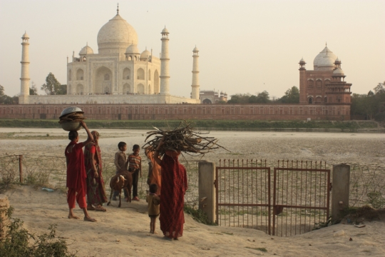 Family stops along the shores of the Yamuna River in Agra, India